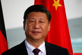 Portrait of the Chinese president in front of a red flag with a star